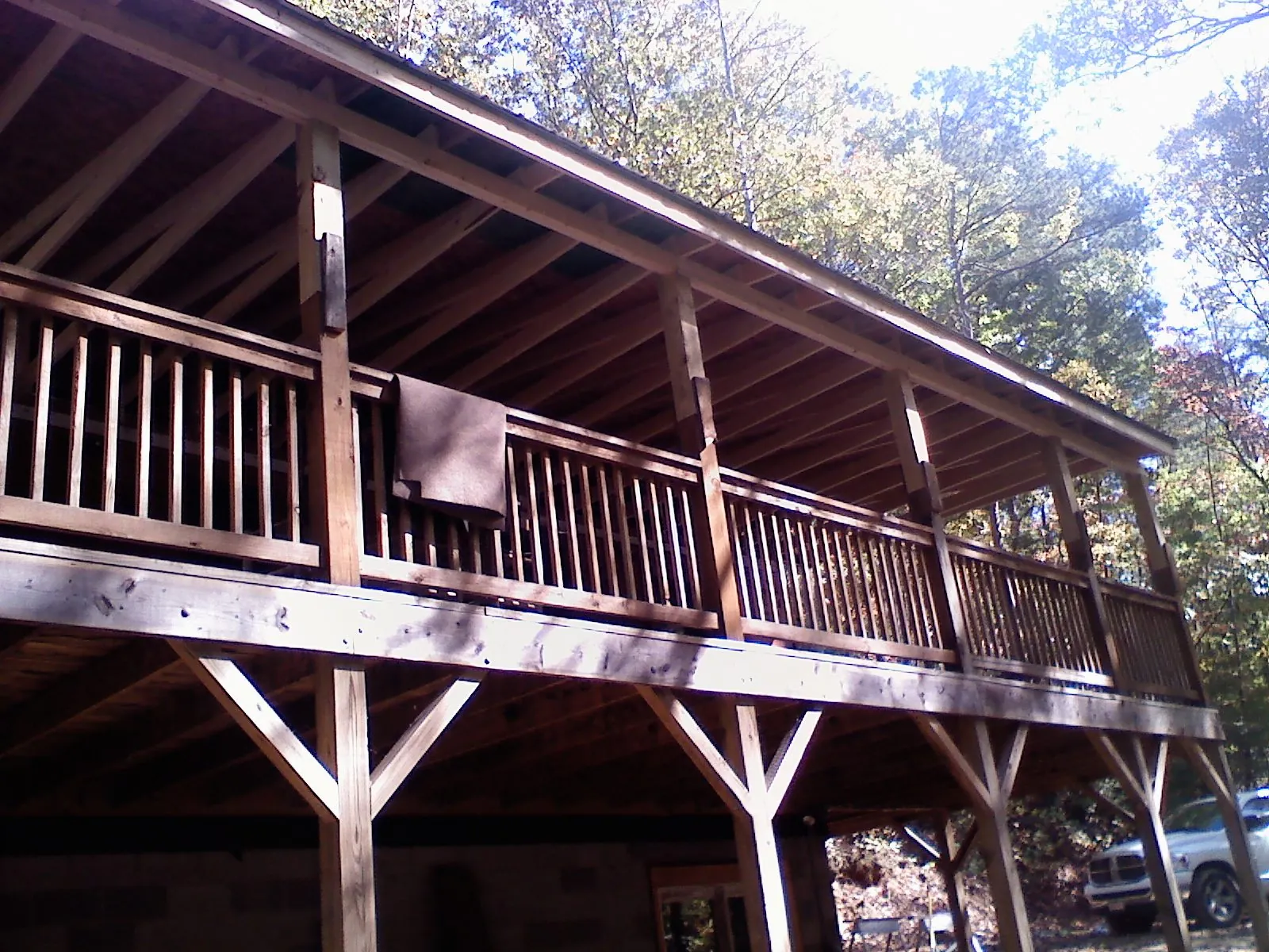 Timber framing under a new elevated porch and deck — Roof Leak Repair in Coldwater by Roofing Brothers